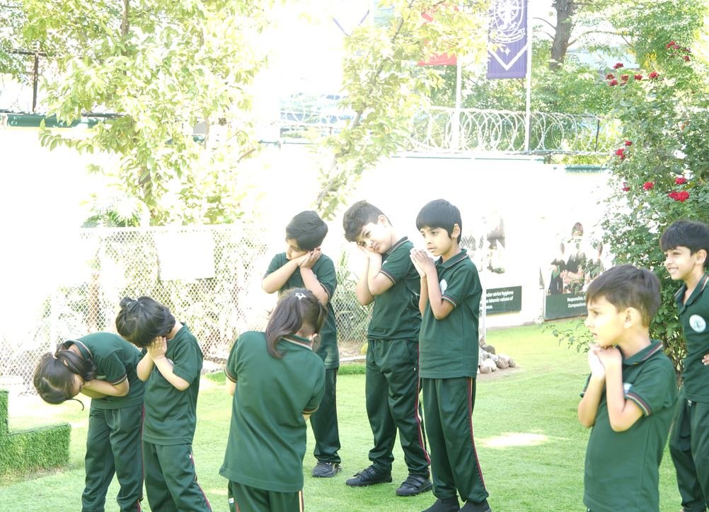 Children playing a group parachute game