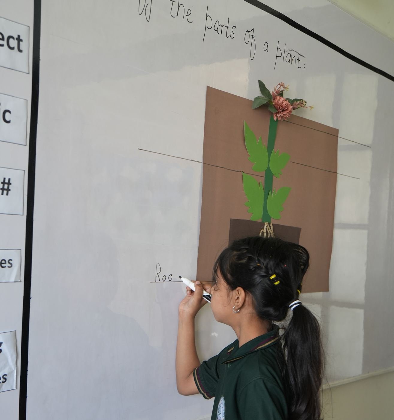 A pupil with a magnifying glass over an open book