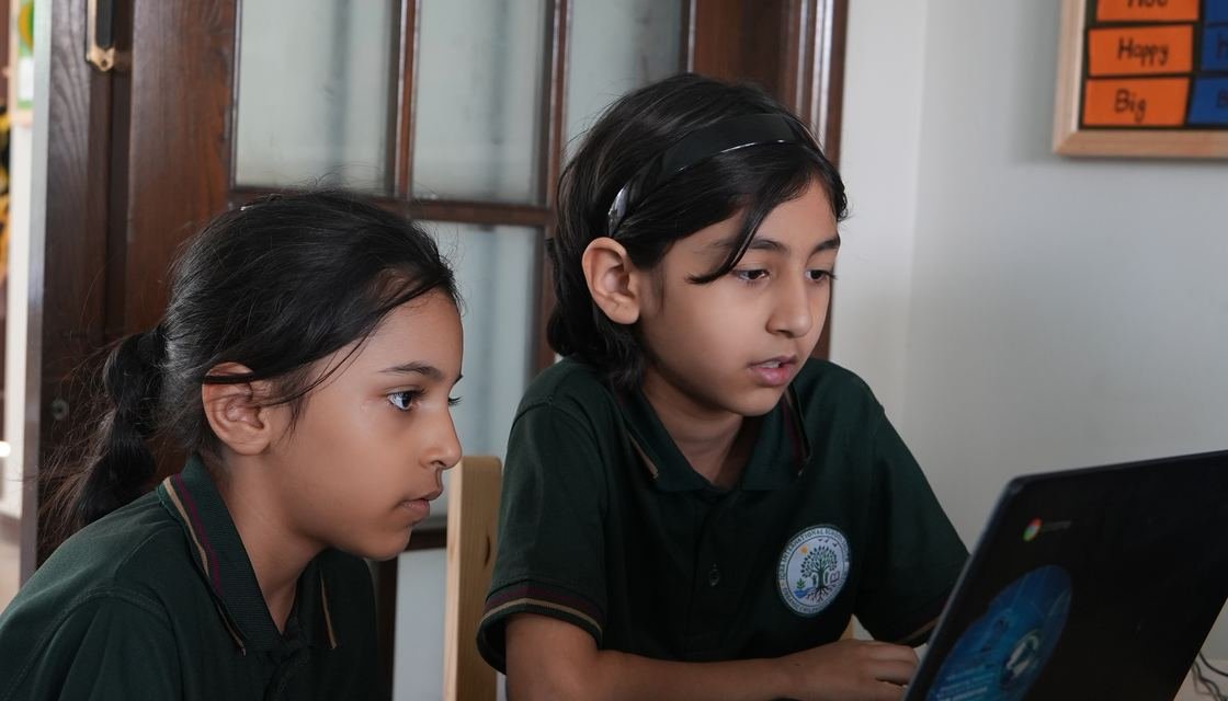 Pupils running an experiment with a flask